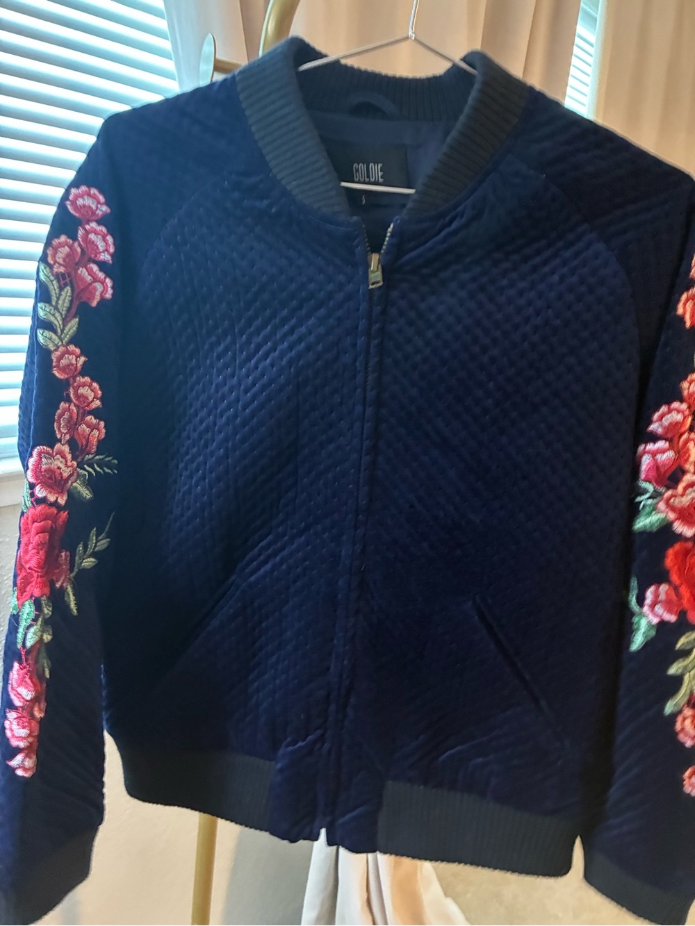 Goldie Navy Quilted Bomber Jacket with Red Floral Sleeve Embroidery